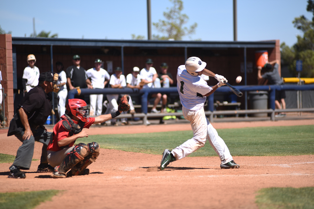 Summerlin Panthers Dylan Orlando (1) Kristian Garcia swings at a pitch against the Las Vegas ...