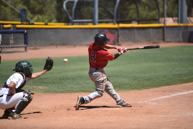 Las Vegas Cats Jason Herrera swings at a pitch against the Summerlin Panthers during the cha ...