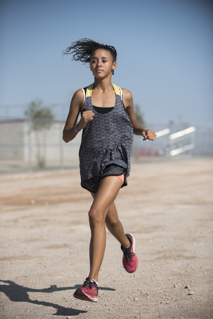 Freshman Diamond Morris, 14, runs during cross country practice at Southeast Career Technica ...