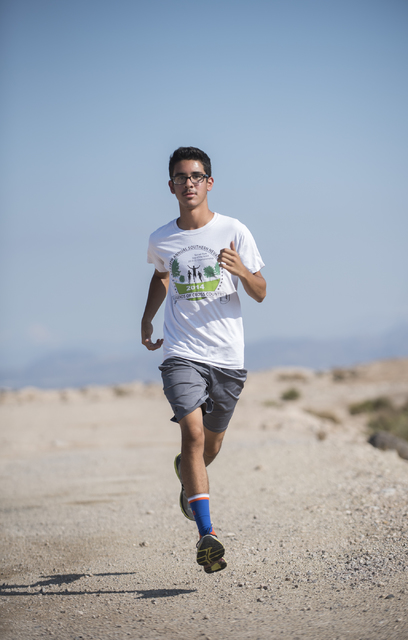 Junior Bruce Troncoso, 16, runs during cross country practice at Southeast Career Technical ...