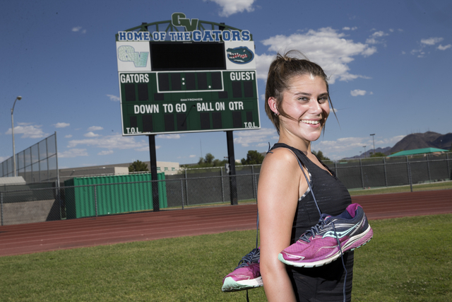 Green Valley cross country runner Mia Smith, 15, is photographed during a team practice at G ...
