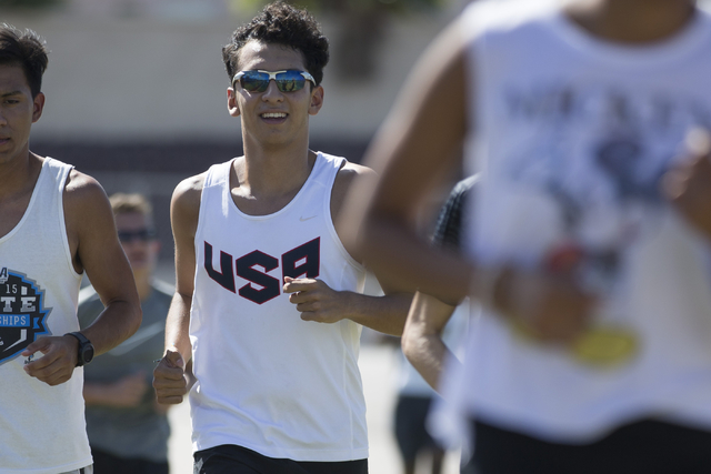 Green Valley cross country runner Lenny Rubi, 17, center, runs during a team practice at Gre ...