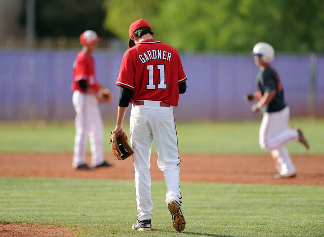 Arbor View starting pitcher Jayce Gardner (11) reacts after giving up a two-run home run to ...