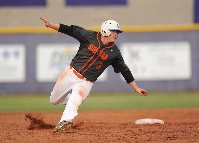 Bishop Gorman base runner Matt Hudgins rounds second base after advancing on an Arbor View w ...