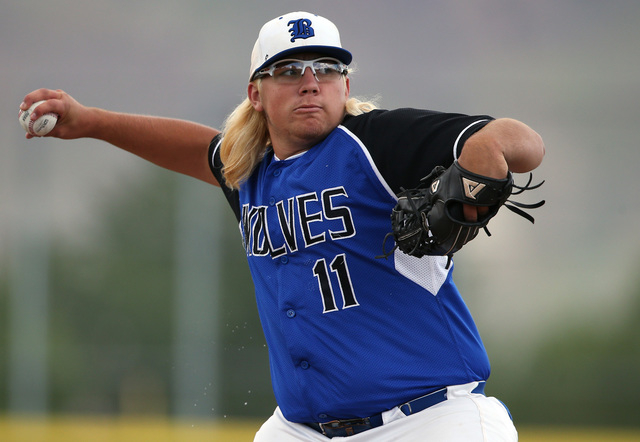 Basic’s Trever Berg pitches against Centennial in the NIAA DI baseball championship g ...