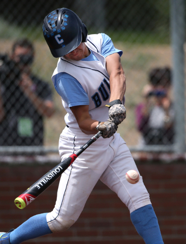 Centennial’s Tanner Wright hits against Galena during NIAA DI baseball action at Bisho ...