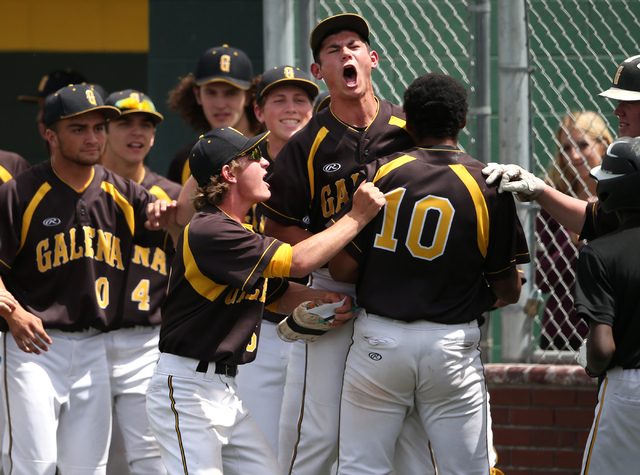 The Galena bench congratulates Jared Kiessling after he hit a home run against Centennial du ...