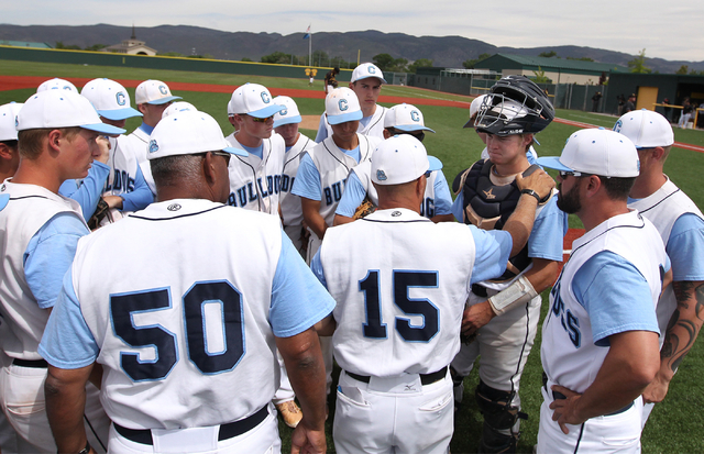 The Centennial Bulldogs talk between innings during NIAA DI baseball action against Galena a ...