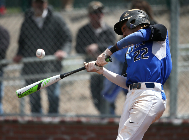 Basic’s J.J. Smith hits against Galena during NIAA DI baseball action at Bishop Manogu ...