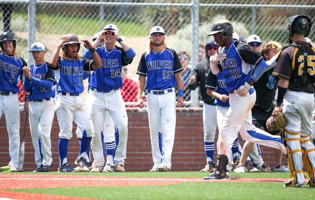 Basic teammates celebrate after J.J. Smith’s home run against Galena during NIAA DI ba ...