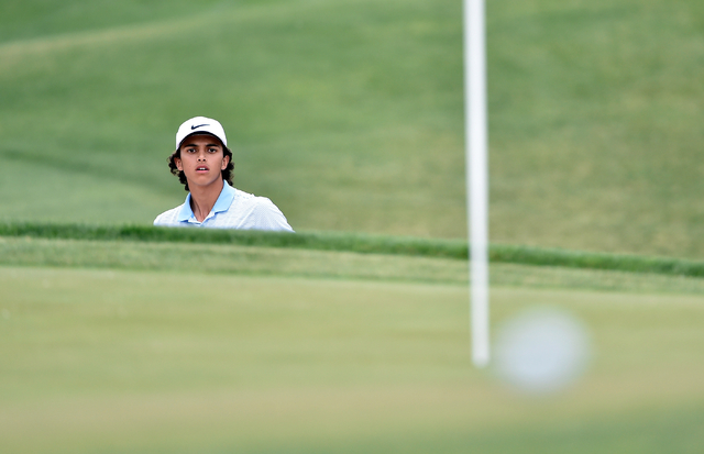Foothill’s Alex Friday checks his ball after hitting out of the bunker during the firs ...