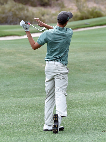 Palo Verde’s Jack Trent lets loose of his club as he takes a second shot on the second ...