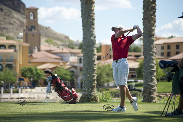 Arbor View’s Sam Dickey hits his ball during the Division I state boys golf tournament ...
