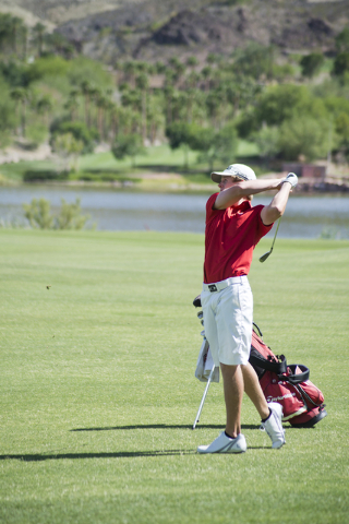 Arbor View’s Sam Dickey hits his ball during the Division I state boys golf tournament ...