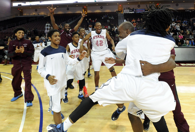 Agassi Prep players celebrate their win over The Meadows School in the Division III boys sta ...