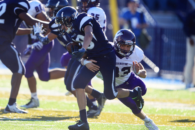 Yerington linebacker Harrison Cisneros brings down The Meadows returner Adam Martinez on a k ...