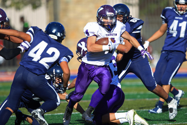 Yearington running back Michael Monahan finds a hole in The Meadows defense during their Div ...