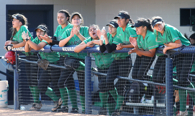 Players on the Rancho bench watch NIAA DI softball action against Reed High School at UNR in ...