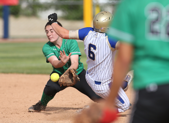 Rancho’s Gianna Carosone tries to make the tag against Reed’s Ryia Grant during ...