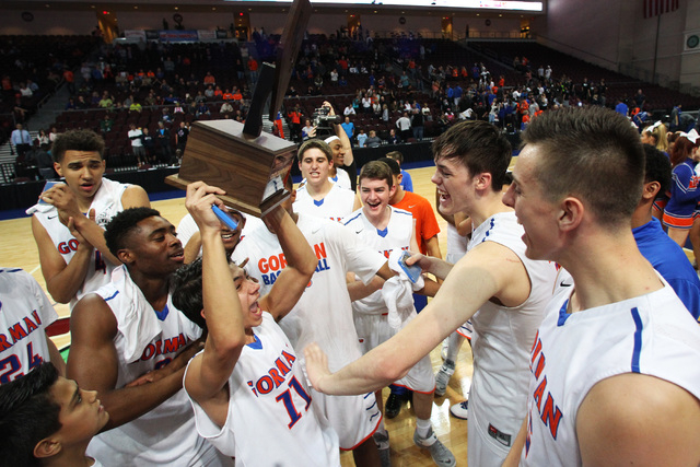 Bishop Gorman celebrates after their victory over Palo Verde in the Division I state champio ...
