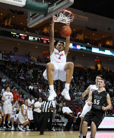 Bishop Gorman center Chae Jeter dunks on Palo Verde during their Division I state championsh ...