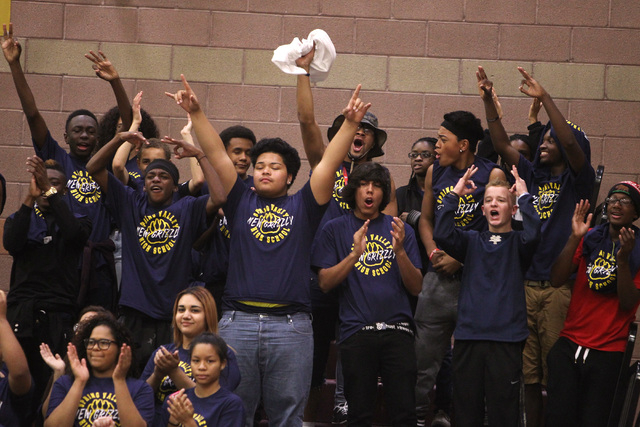Spring Valley students cheer a successful 3-point shot against Faith Lutheran during their g ...