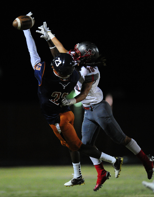 Arbor View safety Phenix Calinao (16) breaks up a pass intended for Legacy wide receiver Mar ...