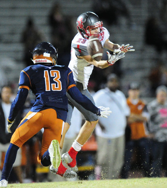 Arbor View running back Deago Stubbs (23) is unable to make a catch while Legacy safety Marc ...