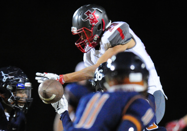 Arbor View running back Deago Stubbs (23) is unable to make a catch up the middle while Lega ...