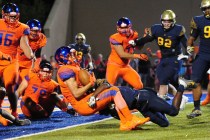 Bishop Gorman running back Biaggio Ali Walsh scores the winning 2-point conversion in triple ...