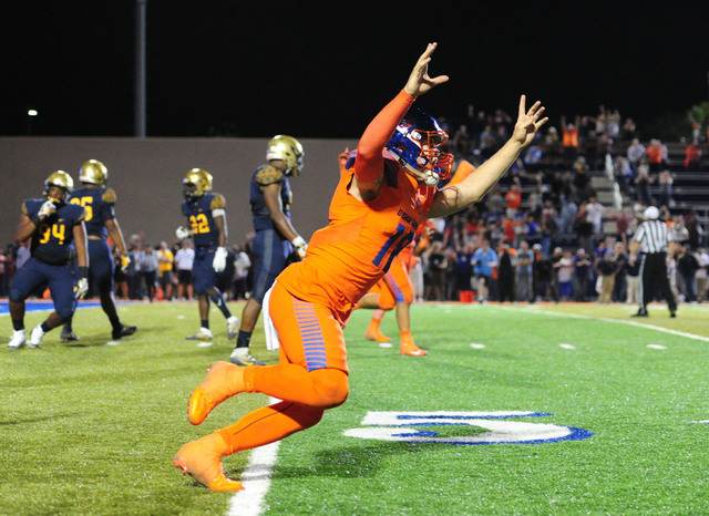 Bishop Gorman quarterback Tate Martell (18) reacts after Bishop Gorman running back Biaggio ...