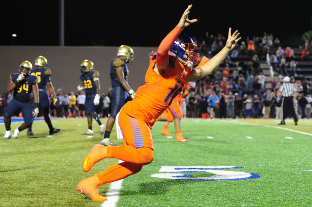 Bishop Gorman quarterback Tate Martell (18) reacts after Bishop Gorman running back Biaggio ...