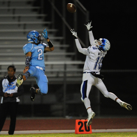 Basic High School wide receiver Xavier Caduto (10) is unable to catch a pass as Canyon Sprin ...