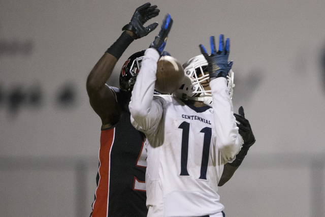 Centennial’s Savon Scarver (11) makes a long catch against Las Vegas in their football ...