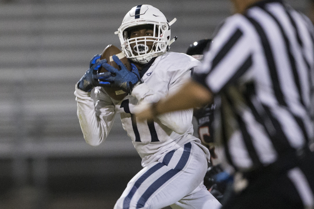 Centennial’s Savon Scarver (11) makes a catch which he ran for a touchdown against Las ...