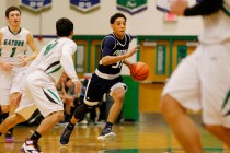 Foothill’s Marvin Coleman (31) drives towards the hoop during a high school basketball ...