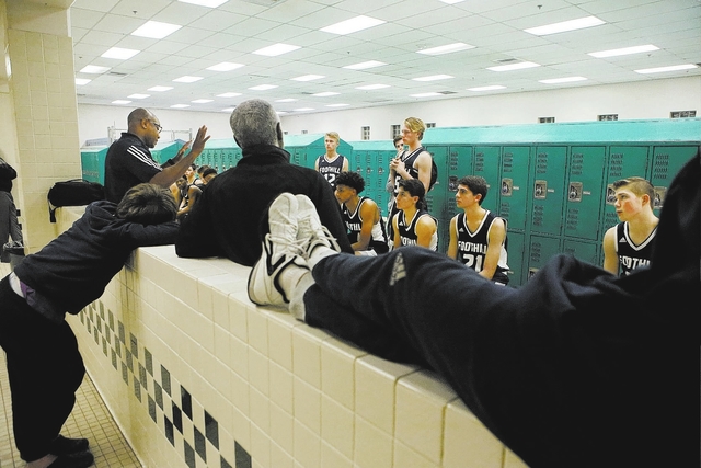 Foothill players listens to their head coach after they won a game against Green Valley at G ...