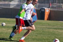 John Lynam, right, runs drills with his soccer teammate at Coronado High School on Tuesday, ...