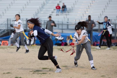 Centennial junior Emily Wilson attempts to run the ball at Centennial High School on Thursda ...