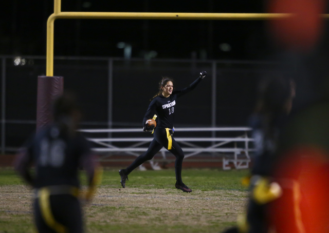 Cimarron-Memorial’s Haylei Hughes (18) celebrates after scoring a touchdown on an inte ...