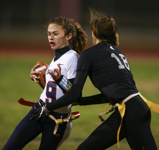 Cimarron-Memorial’s Haylei Hughes (18) tags out Coronado’s Caitlin Shannon (9) d ...