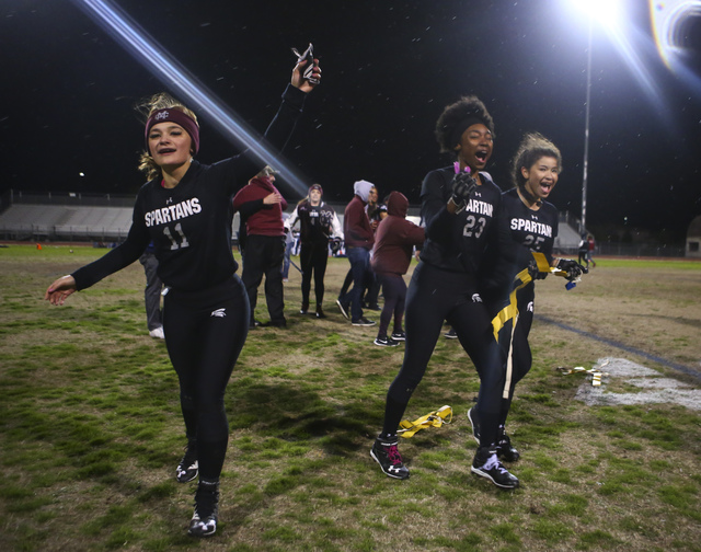 Cimarron-Memorial players celebrate after defeating Coronado 24-7 in the Class 4A state cham ...