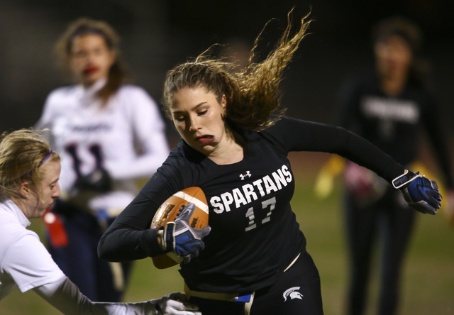 Cimarron-Memorial’s Alyssa Karpinski (17) is tagged out by Coronado during the Class 4 ...