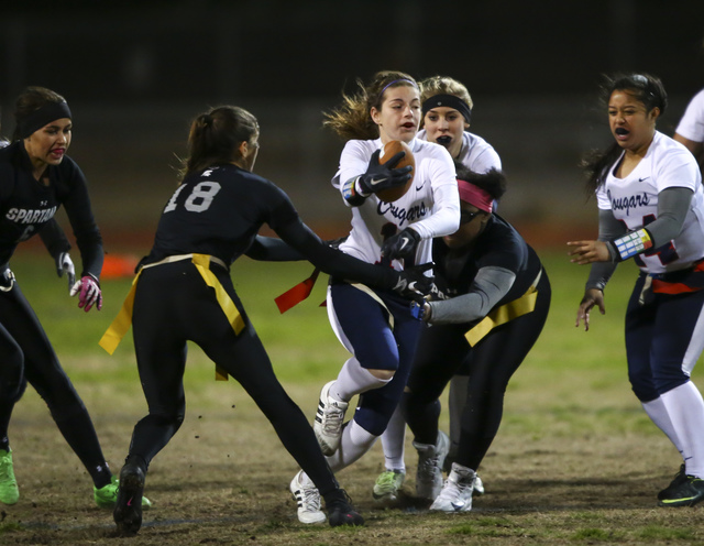 Coronado’s Trinity Rhoades (11) is tagged out by Cimarron-Memorial’s Haylei Hugh ...