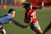 Cimarron-Memorial’s Jaymee Luke is tackled by Green Valley’s Allisa Hildreth dur ...