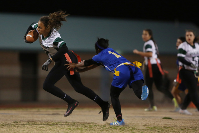 Palo Verde sophomore Mya Boykin attempts to run the ball as Sierra Vista junior Courtney O&# ...
