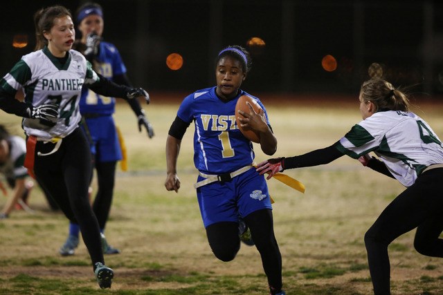 Sierra Vista junior Courtney O’Neal runs the ball at Sierra Vista High School on Thurs ...