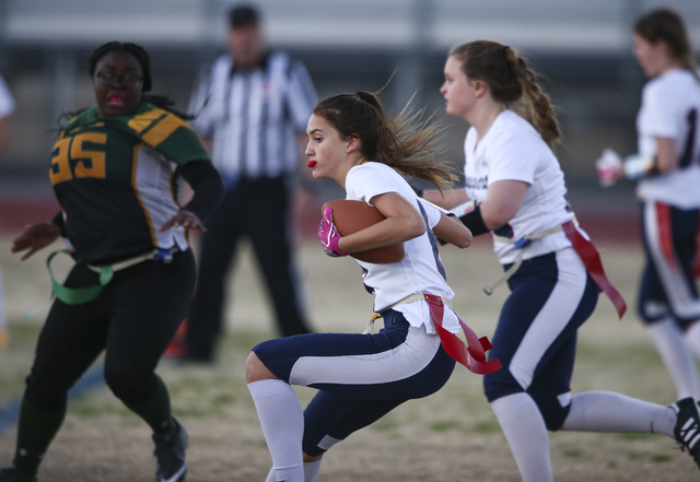 Coronado’s Brittany Whitt (8) runs the ball against Rancho during a flag football game ...