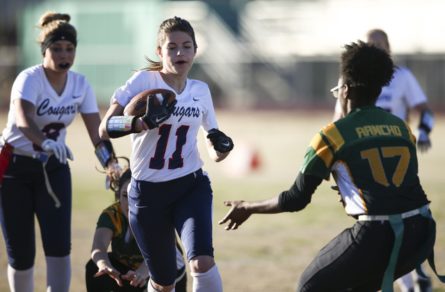 Coronado’s Trinity Rhoades (11) runs the ball against Rancho during a flag football ga ...