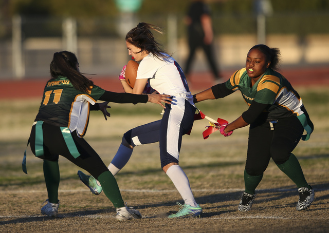 Coronado’s Brittany Whitt (8) is tagged out by Rancho players, including Marina Cruz ( ...